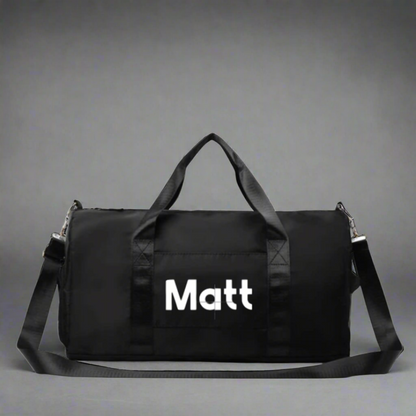 Personalised black gym bag with different compartments. Gift idea for men