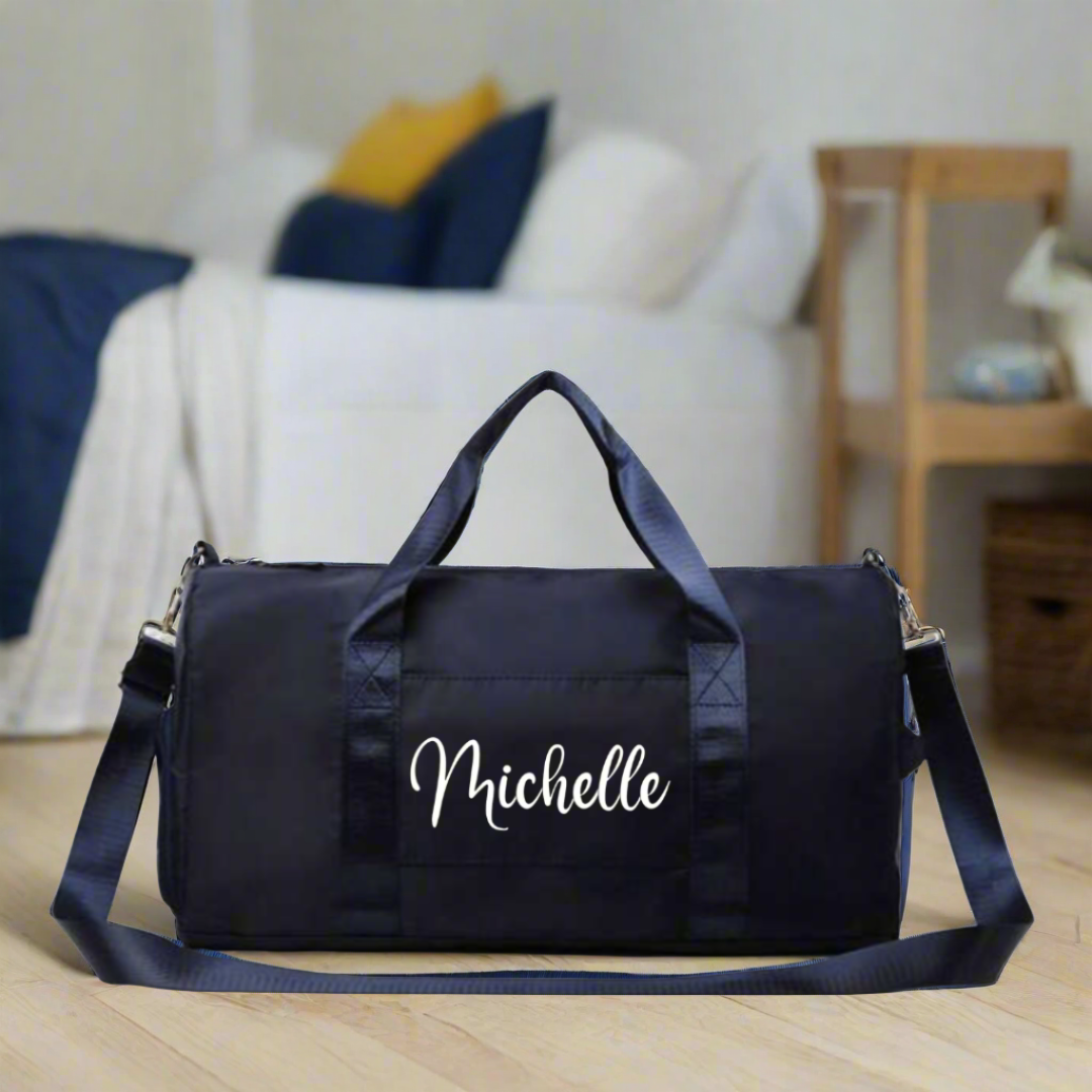 Personalised overnight bag in navy. many compartments, use for gym, dance, sport, overnight trips