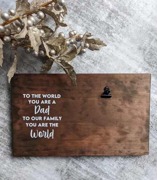 To the world you are a dad to our family you are the world. Wooden photo plaque to display a photo with quote to celebrate dads, fathers, grandfathers